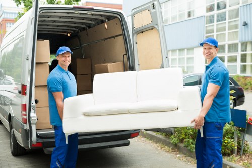 Sofa being prepared for removal
