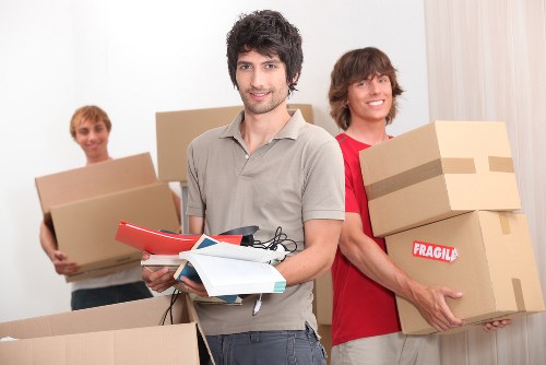 Team handling sofa collection efficiently